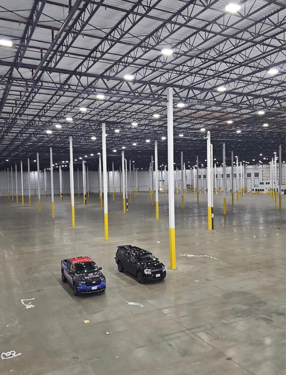 Bantel HVAC service vehicles inside a large commercial warehouse