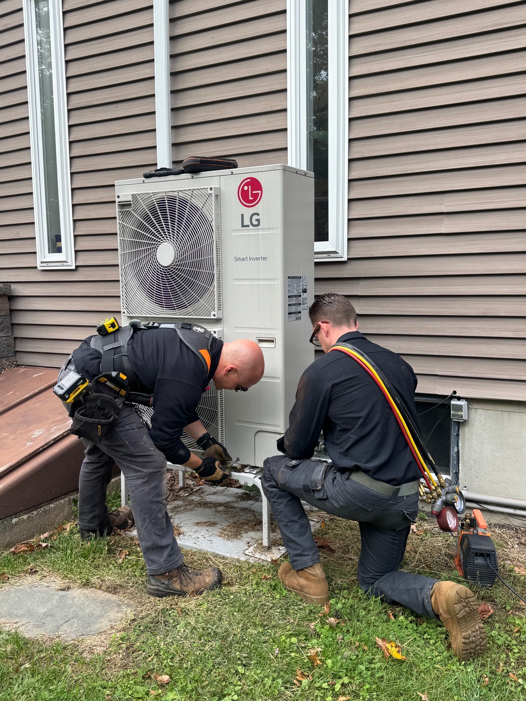 Our team at work on an LG heat pump
